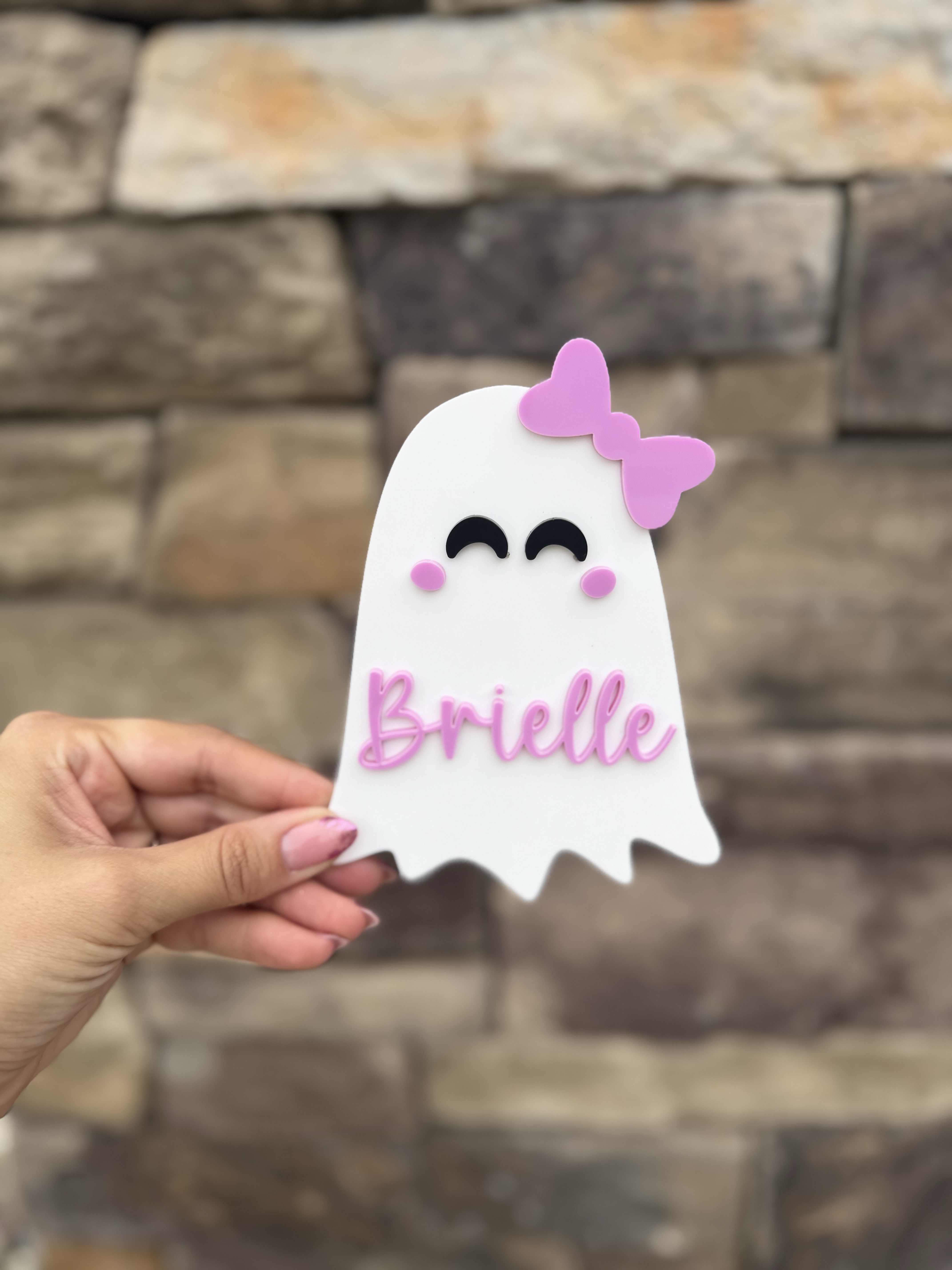 Personalized Brielle ghost-shaped Boo Bag name tag with a pink bow