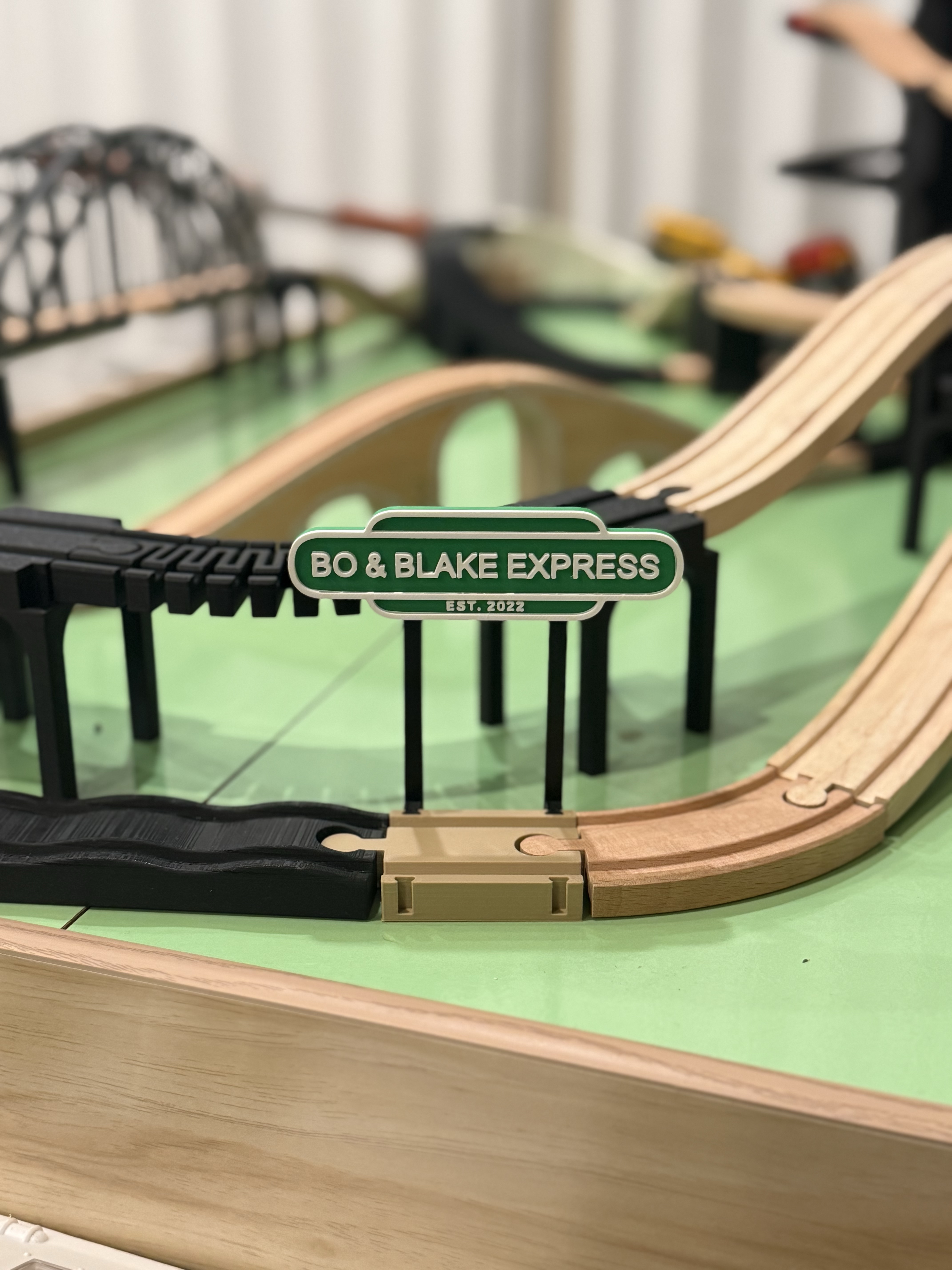Personalized Bo and Blake Express sign on a wooden train track display