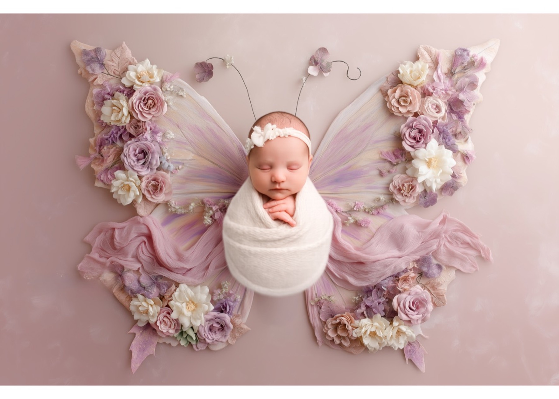 Newborn butterfly photography prop decorated with flowers